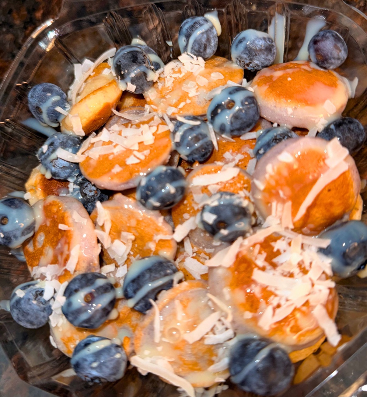 Blueberry coconut mini pancakes close-up